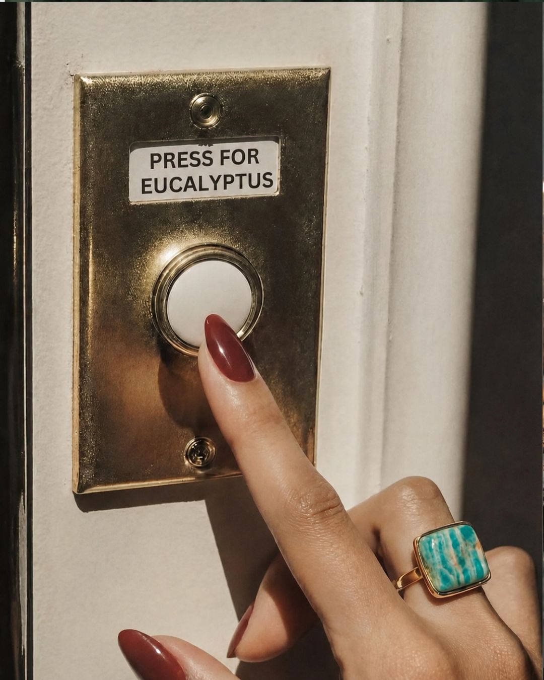 Press for eucalyptus sign in a hospitality-inspired setting